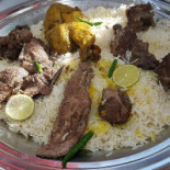 Madfoon Al Khaima مطعم مدفون الخيمه Comida