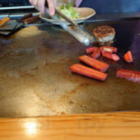 Zhí Bǎn Jū Jiǔ Wū Yī Fú Comida