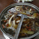 Yáng Jiā Shāo Kǎo Tǔ Chǎn Yáng Ròu Lú Comida