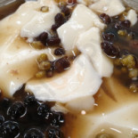 Zhōu Jì Dòu Huā Comida
