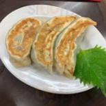 Huì Bǐ Shòu Tiān Xià Yī Xīn Qiáo Diàn Comida