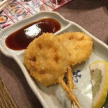 Qiū Jí Fú Jǐng Yì Qián Diàn Comida