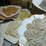 Hòu Yuàn Pí Jiǔ Kǎo Ròu Comida