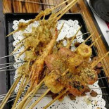 Hòu Yuàn Pí Jiǔ Kǎo Ròu Comida